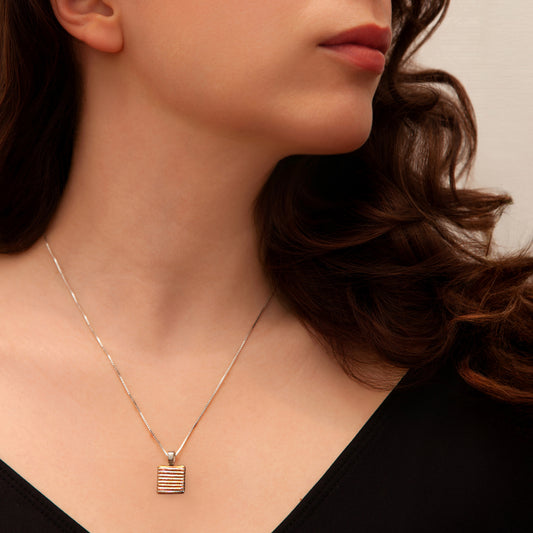 Square gold striped dichroic glass pendant on sterling silver box chain, from the Astra Collection, handmade and full of warmth.