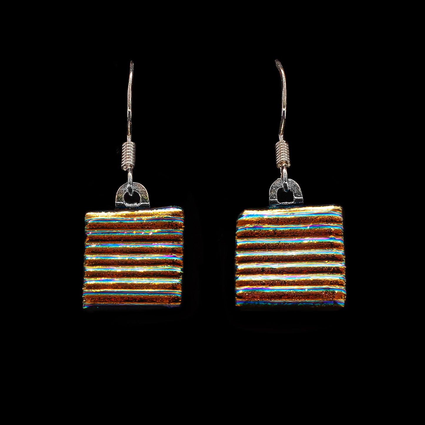 Gold striped dichroic glass drop earrings from the Astra Collection, square cut and handmade with shimmering layered texture.