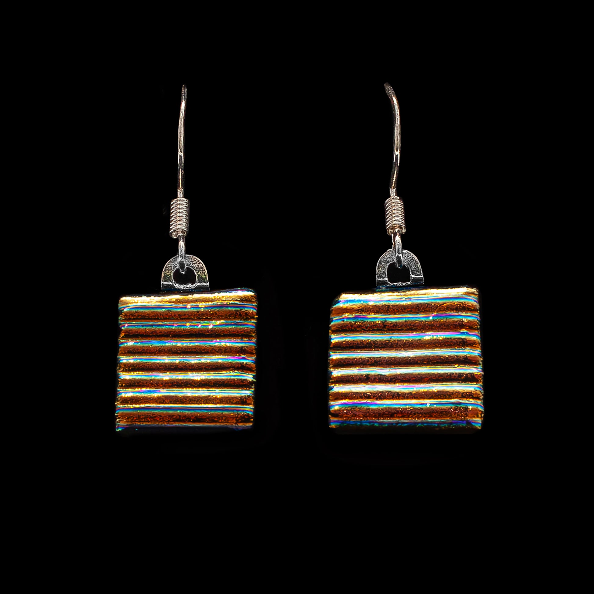 Gold striped dichroic glass drop earrings from the Astra Collection, square cut and handmade with shimmering layered texture.