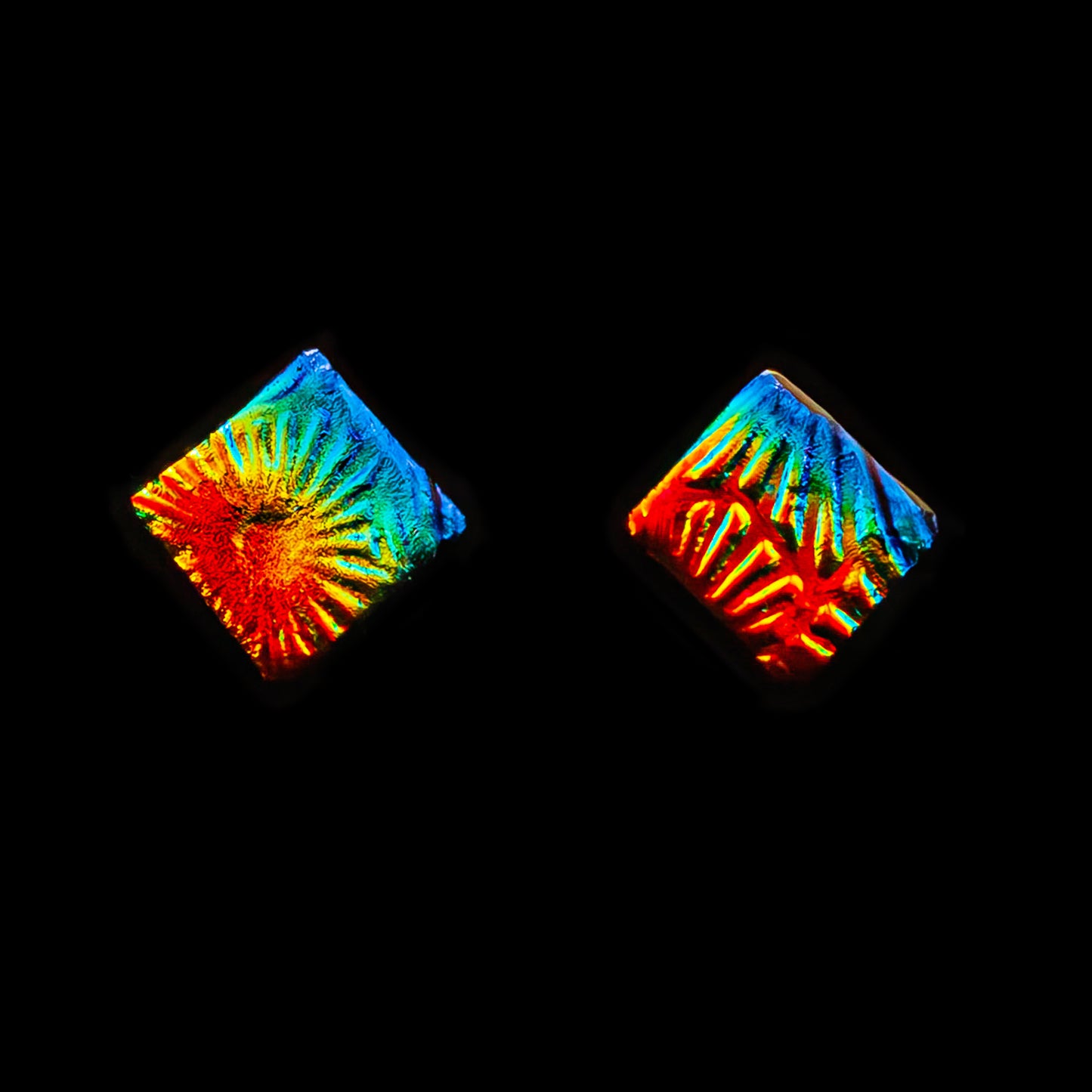 Rainbow florentine square dichroic glass stud earrings with vibrant texture and colour shift, handmade in London by Invoke London.
