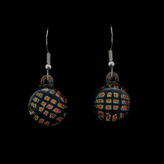 Round black dichroic glass drop earrings with red and gold square shimmer, handmade in London by Invoke London with sterling silver hooks.