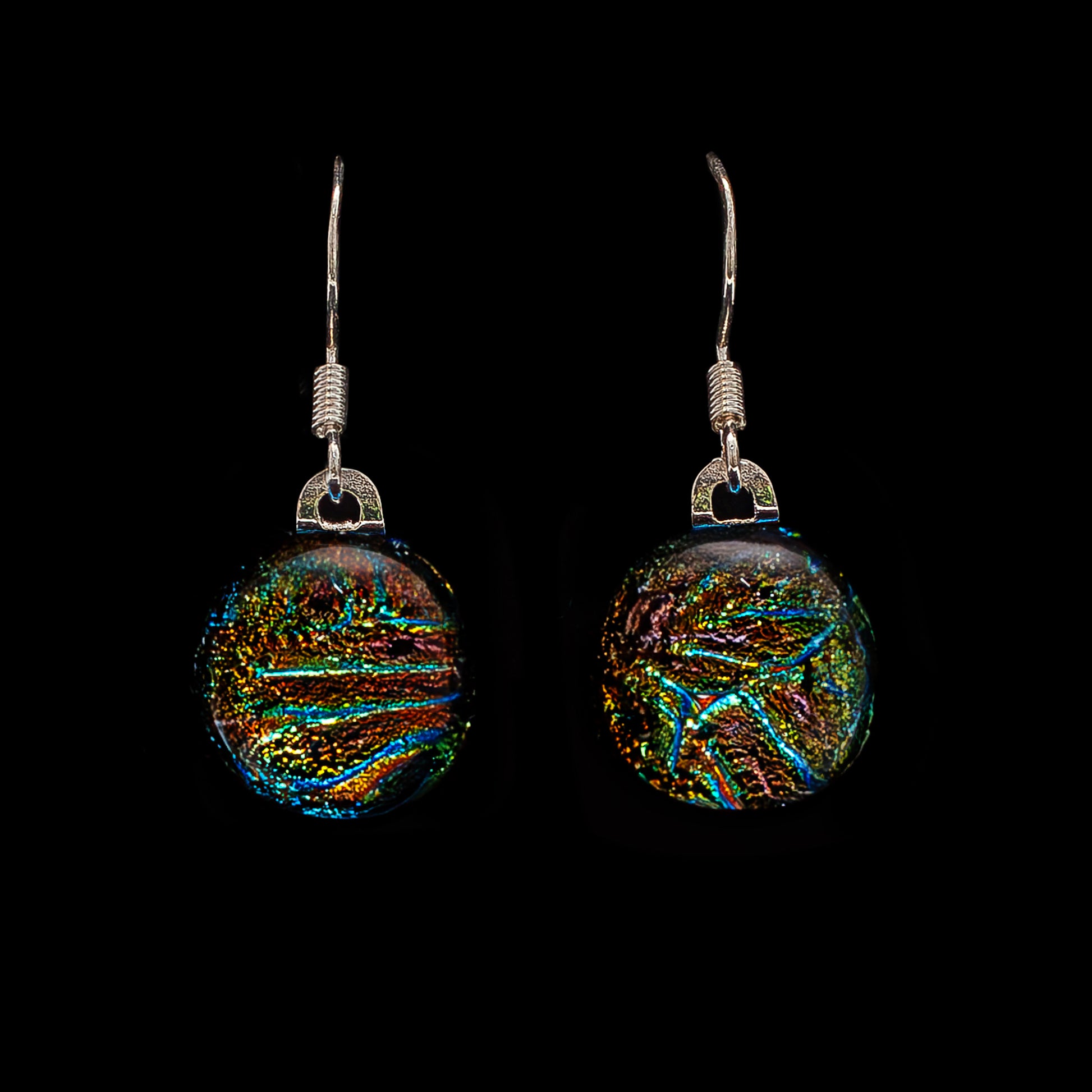 Round gold florentine dichroic glass drop earrings with shimmering finish, handmade in London by Invoke London with sterling silver hooks.