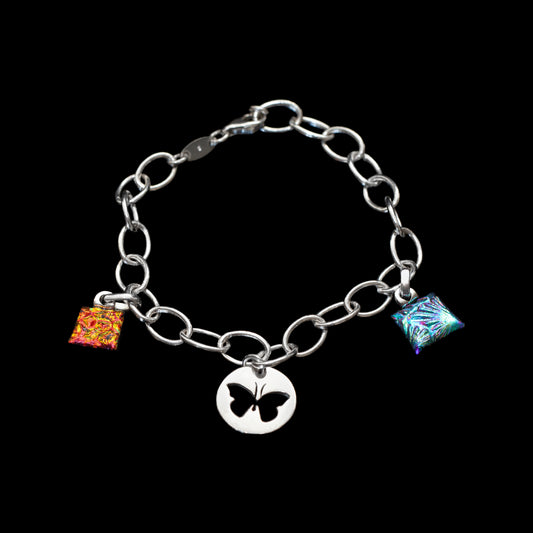 Silver chain bracelet with colorful charms on a black background