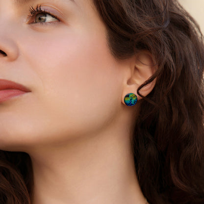 Close-up of green and gold ripple dichroic glass studs showing luminous texture and colour-shifting shimmer.