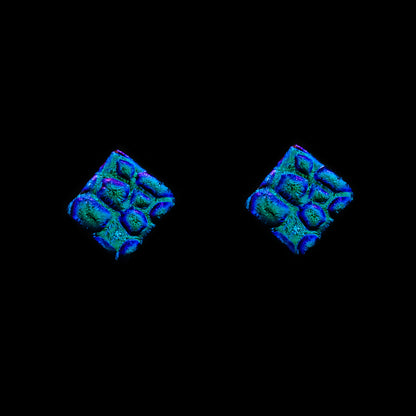 Square blue dew drop dichroic glass stud earrings with textured shimmer, handmade in London by Invoke London with sterling silver posts.