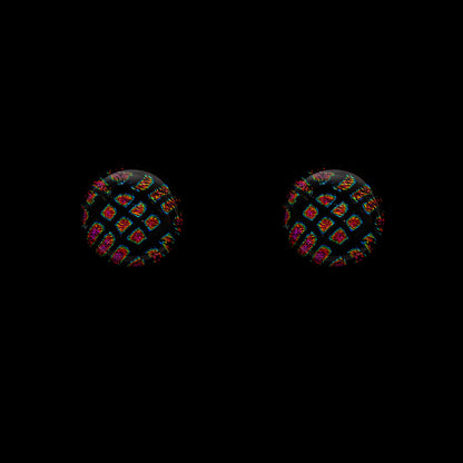 A pair of round stud earrings featuring a black and red square pattern on a dichroic glass surface.