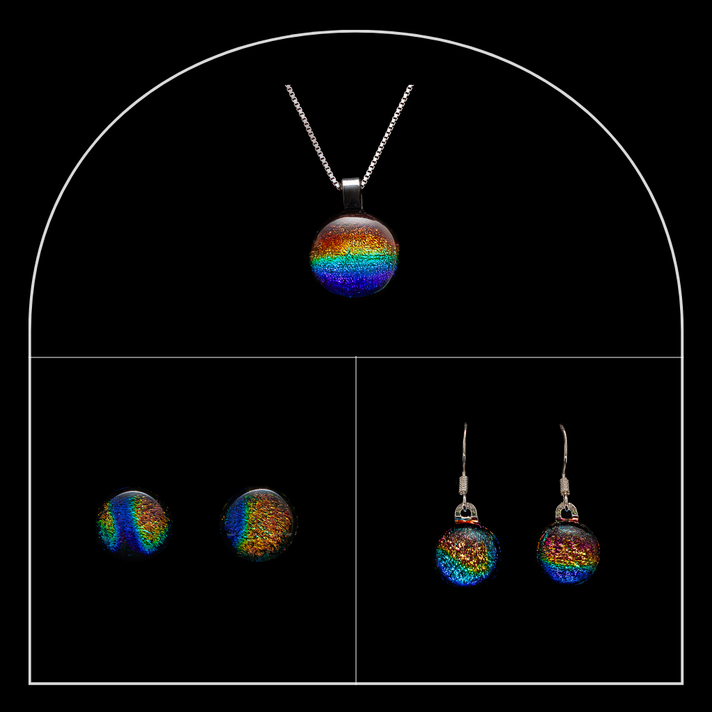 Rainbow round dichroic glass jewellery set from the Orb collection by Invoke London, with pendant, studs, and drops.