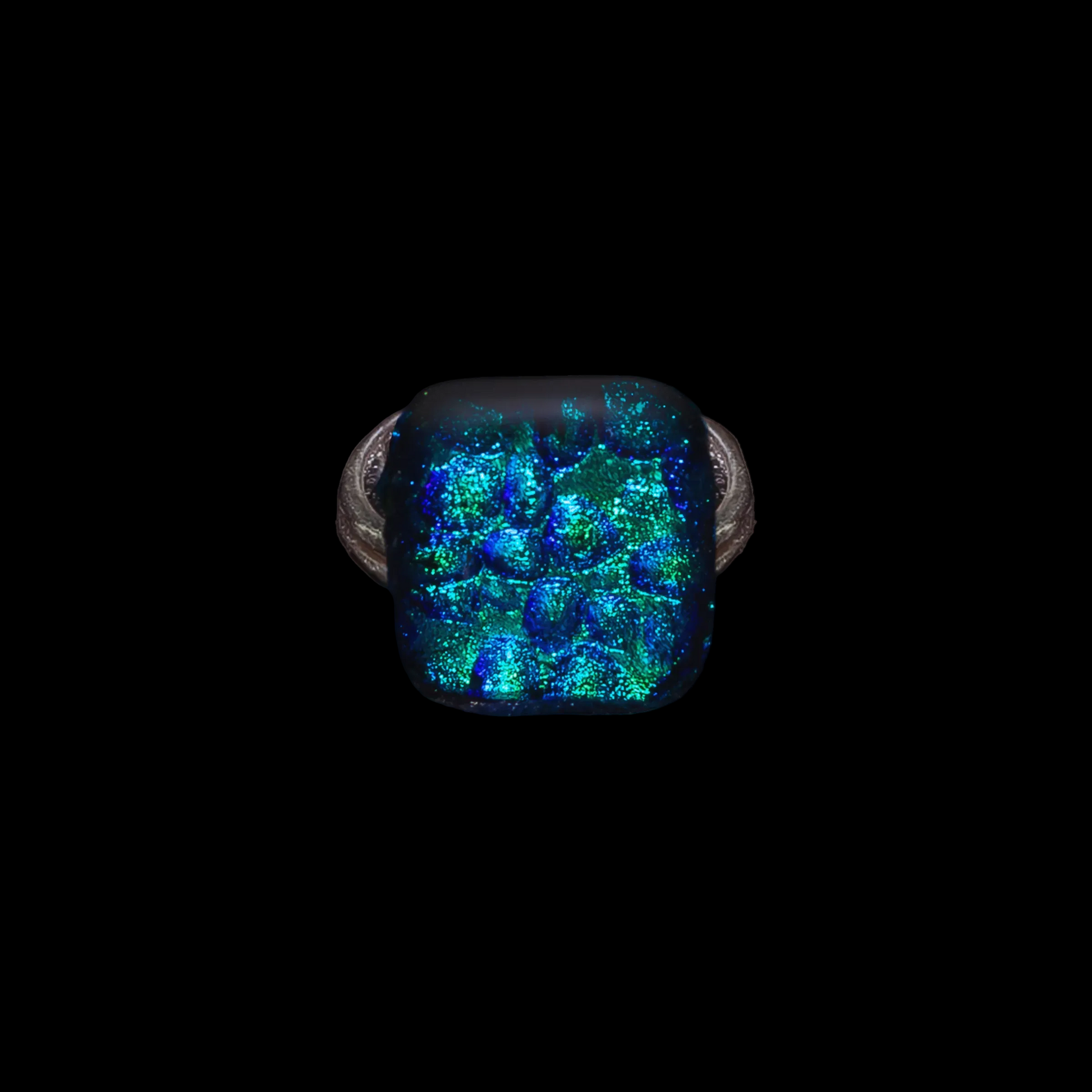 Ring with a blue and green patterned stone on a black background